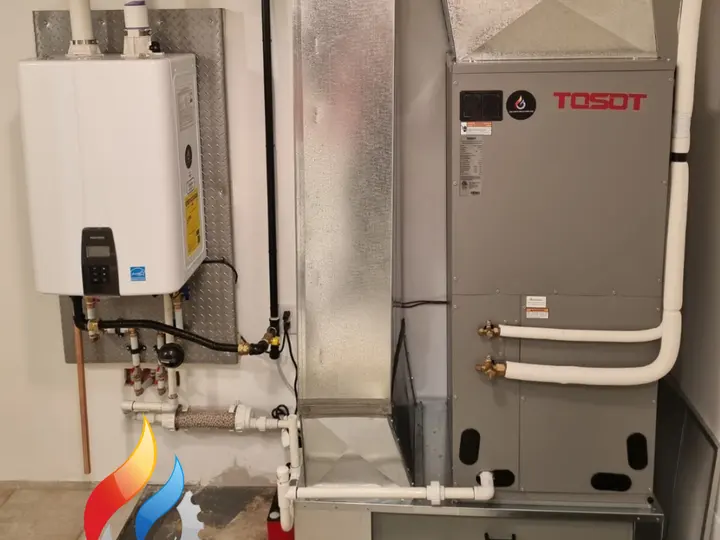 Tosot air handler and Navien tankless water heater installed in a mechanical room
